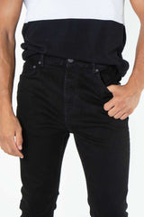 alt="Francisco Tolli black carrot denim jeans front close view"