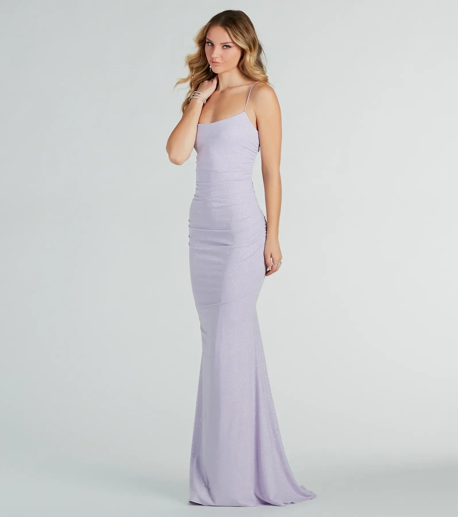 Shimmer through every feed refresh in the Rowan Formal Glitter Ruched Mermaid Dress, a viral-worthy look from Windsor's lavender prom dresses that nails bold, confident energy.