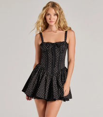 Step into seasonal chic with the Pretty Vibes Polka Dot Drop Waist Skater Dress, a black mini dress featuring an above-the-knee cut ideal for cocktail parties, festive gatherings, or clubwear.