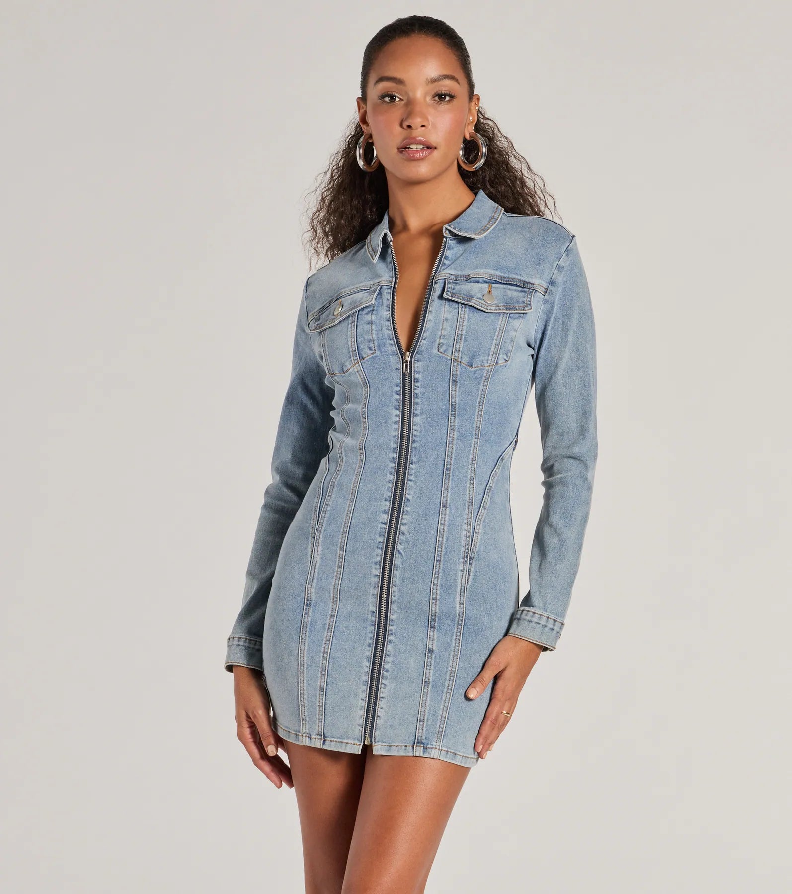 The Sweet Looking Long Sleeve Denim Mini Dress is a mini dress that will make a statement with its short hemline and on-trend details to have you ready for any event!
