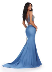 Step onto the prom scene in this stunning Ashley Lauren 11511 long prom dress. The denim two piece gown features a fully beaded bustier for a touch of glam. With its unique design and intricate detailing, you're sure to turn heads and make a statement. Experience the perfect blend of style and comfort in this one-of-a-kind prom dress. This fabulous denim two piece features a fully beaded lace up bustier and a fitted skirt with a beaded waist belt.