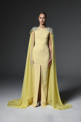 Yellow embroidered crêpe dress featuring chiffon cape