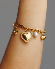 Pulsera de charms con relicario