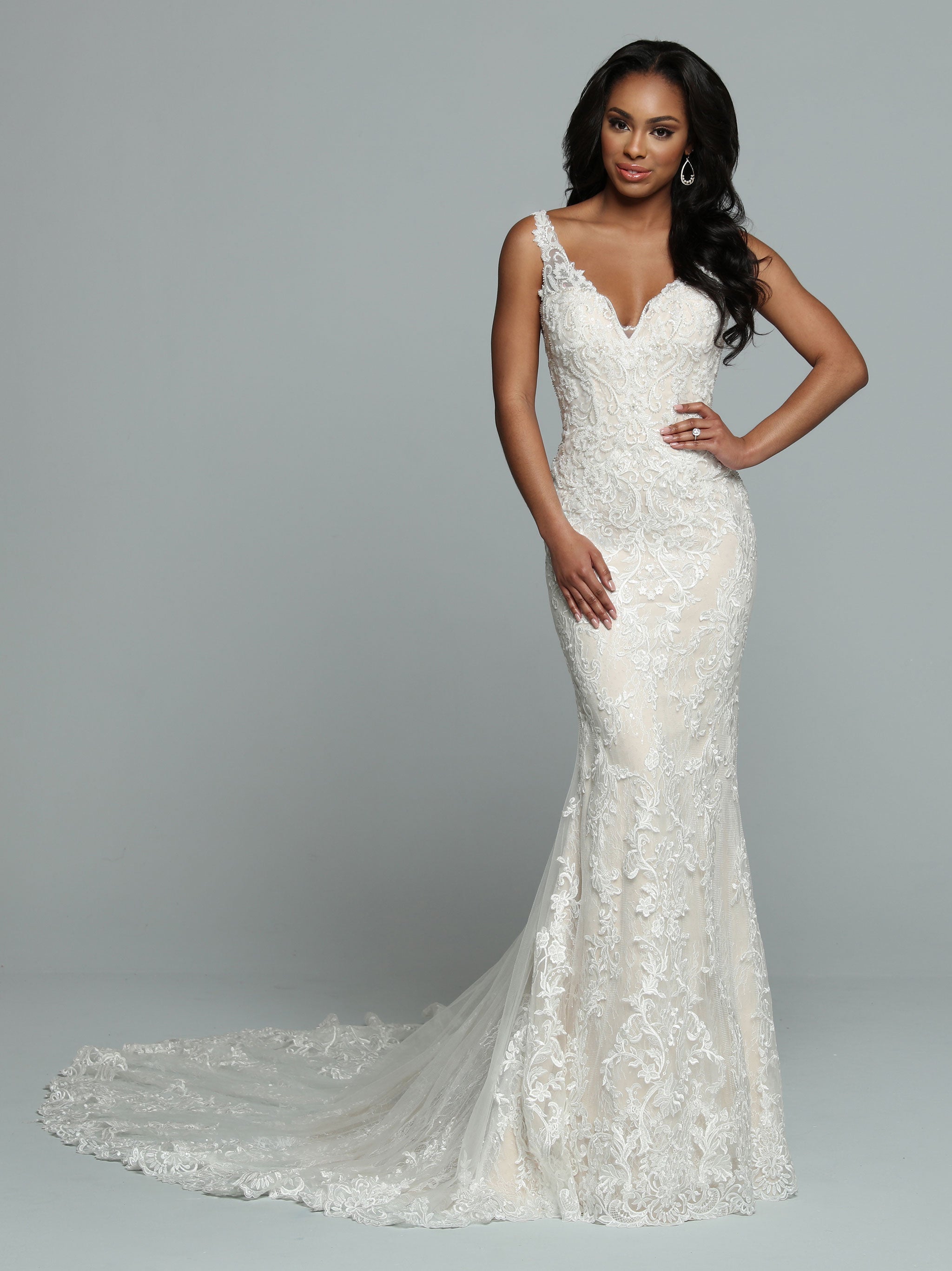 Davinci Bridal 50660 is a Fitted Lace wedding dress with sheer lace straps. this fit & flare Bridal Gown is backless. Great bridal gown Size 12 Ivory/Blush