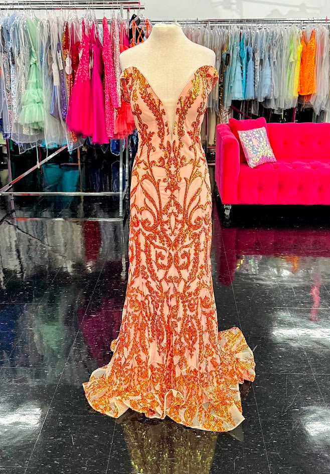 Jovani 63349 Long Fitted sequin embellished Damask Print pageant gown with off the shoulder straps, sexy fit & Flare mermaid prom dresses, Pageant dresses & Formal Evening wear by Jovani! Lush Skirt with sweeping train.
Available Colors: Peach
available Sizes: 24
Details: Black and gold sequin embellished prom dress with off-the-shoulder fitted bodice and sweetheart neckline, floor-length fitted skirt with long train.
Neckline: Sweetheart
Waistline: Natural
Closure: Invisible b