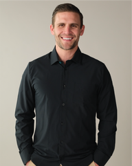 Man wearing a black dress shirt