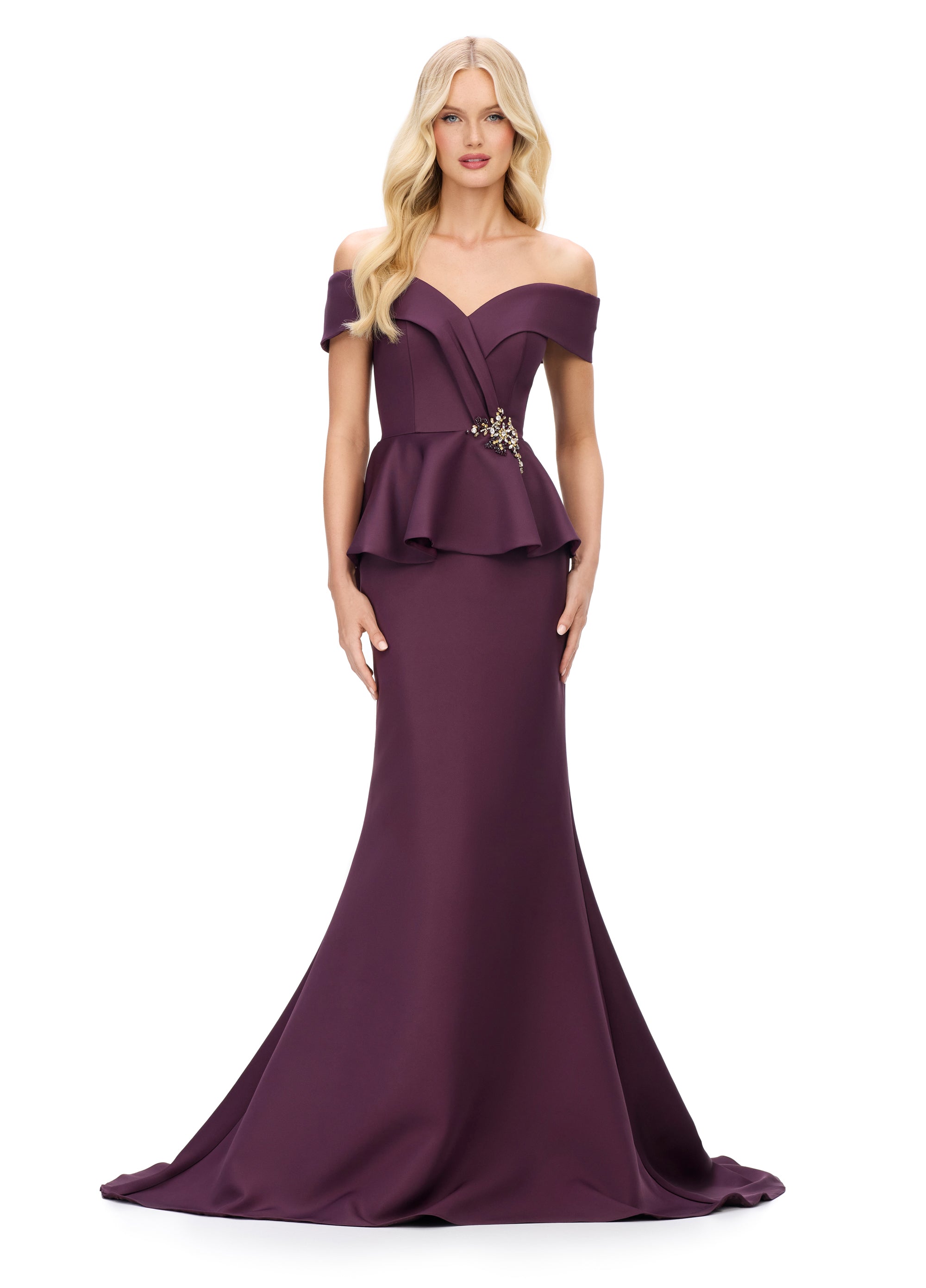 Ashley Lauren 11710 Off The Shoulder Evening Gown. Featuring a flattering V neckline and peplum waist, this long fit and flare dress brings elegance to any occasion. Its off the shoulder design adds a touch of romance while accentuating your figure. Elevate your evening style with this stunning dress. Colors: Navy, Blush, Wine