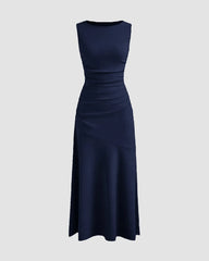 Front view of Dark navy sleeveless maxi dress with fitted bodice and flared hem, shown front and back on background.