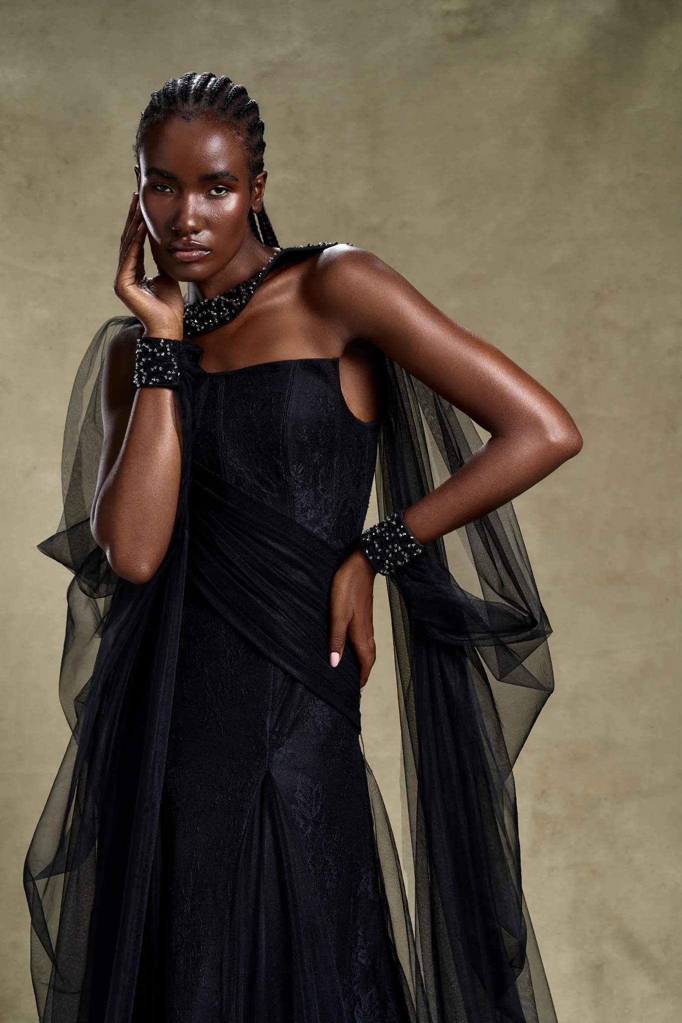 Obsidian Elegance: stunning strapless maxi dress with sheer draped fabric, perfect for high-end fashion evening wear.