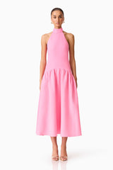 Brunette model wearing The Nolana Halter Midi dress in Pink front shot