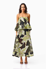 Brunette model wearing the Elysia Tiered Gown in Black & Green Floral front shot