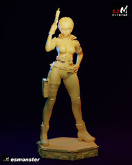 Painted Motoko Kusanagi collectible figure posed holding SMG, wearing detailed tactical bodysuit and gear.