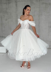 Short Glittery Tulle Off-Shoulder Dress with Lace-Up Closure – front view | AmberBride