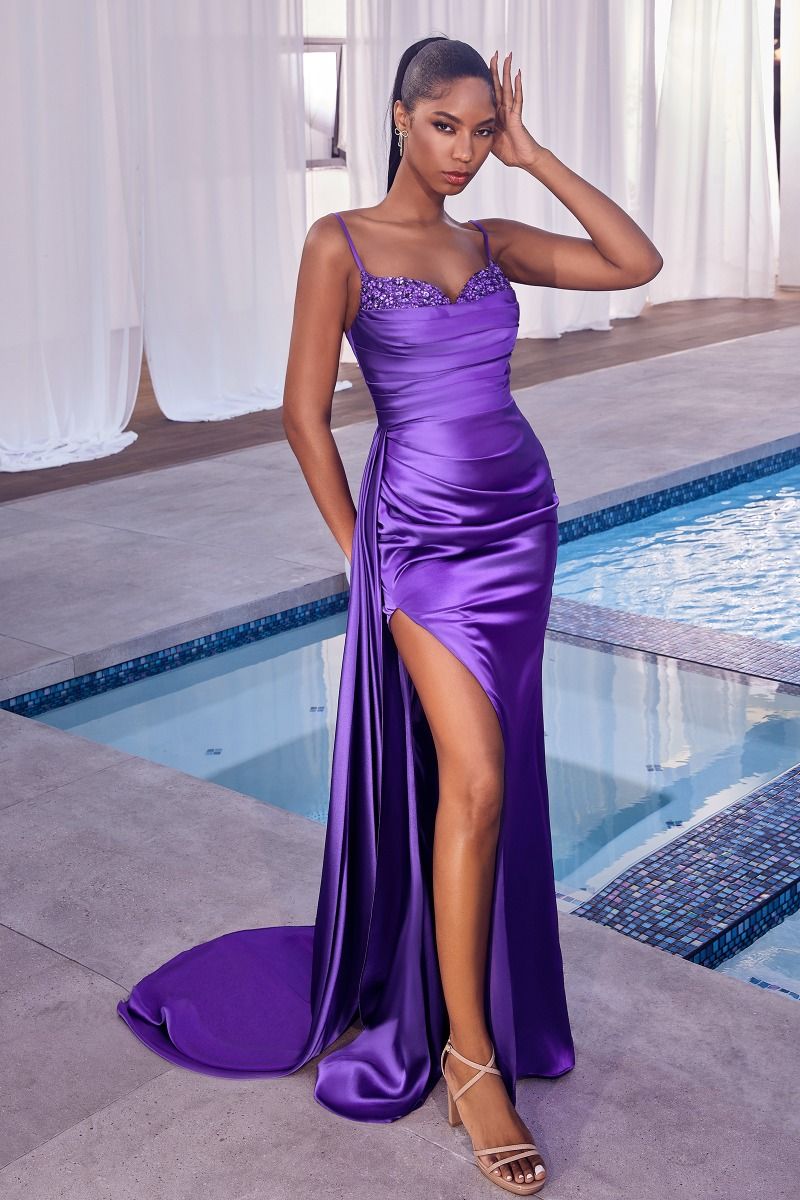 Elevate your prom night with the Ladivine CD340 Long Satin Slit Overskirt Prom Dress. This formal pageant gown is fitted and ruched, creating a flattering silhouette. The satin material and slit overskirt add elegance and sophistication. Make a statement with this must-have dress.