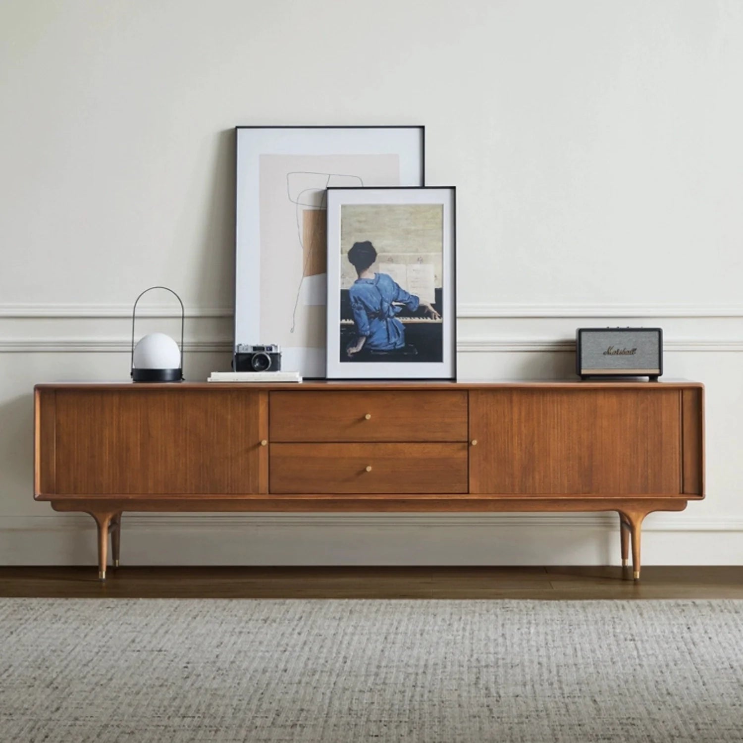 a mid century tv stand image, with two doors and drawers