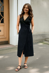 Black linen wrap dress with midi length and adjustable tie waist