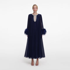 Front view of a woman wearing the Navy Chiffon Feather Midi Dress
