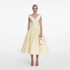 Front view of a woman wearing the Yellow Cotton Midi Dress