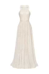 Ivory tiered halter maxi dress by Montsand featuring flowy fabric and a sleeveless design, perfect for elegant summer occasions.