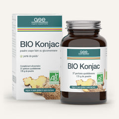 Eine braune Glasflasche und eine Schachtel mit der Aufschrift BIO Konjac FR von gse.organic.supplements in Grün und Weiß werben für ein biologisches, veganes Nahrungsergänzungsmittel mit Konjakwurzel-Ballaststoff Glucomannan - gluten- und laktosefrei.