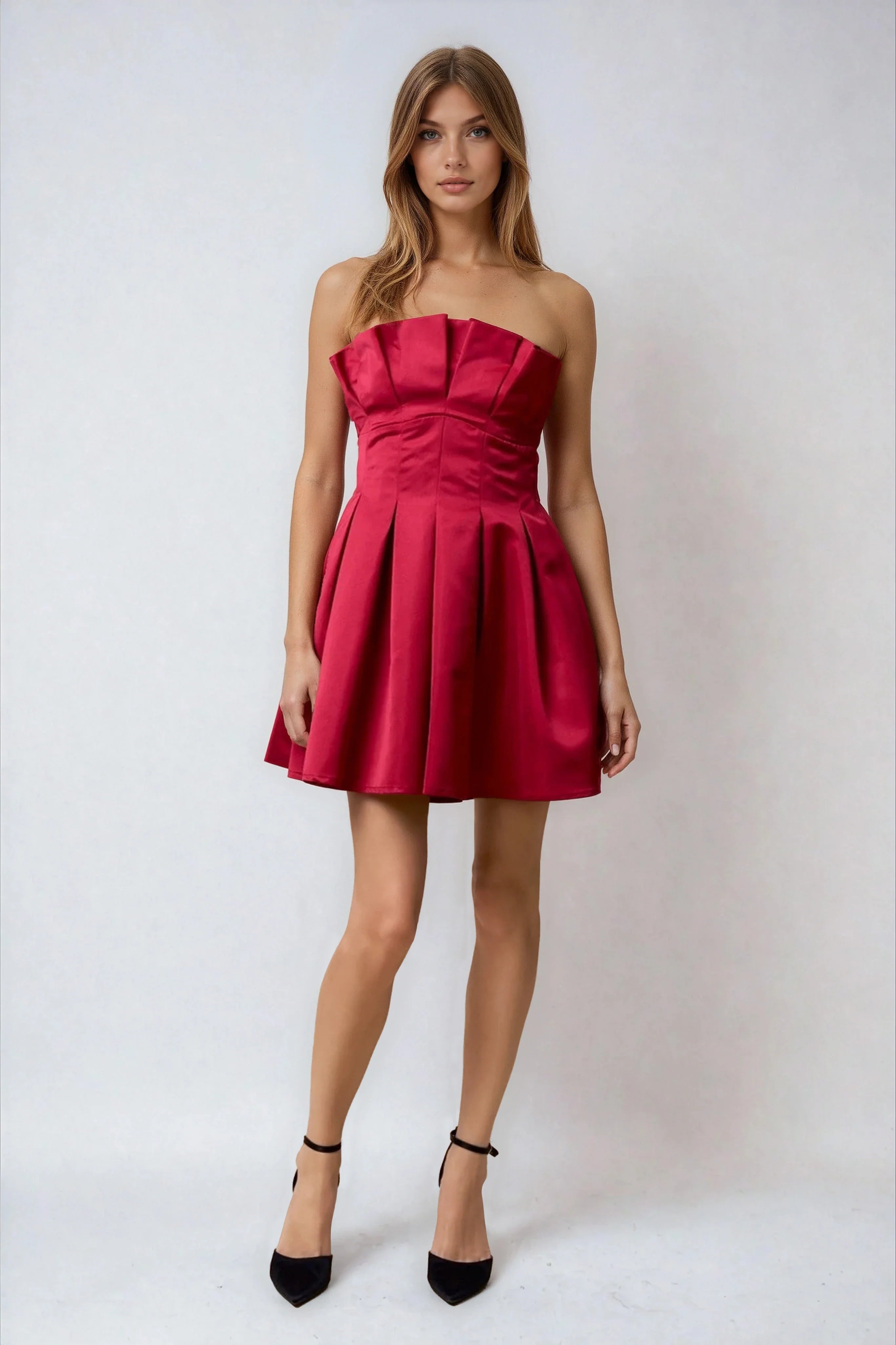 red strapless flared mini dress with pleating for holidays
