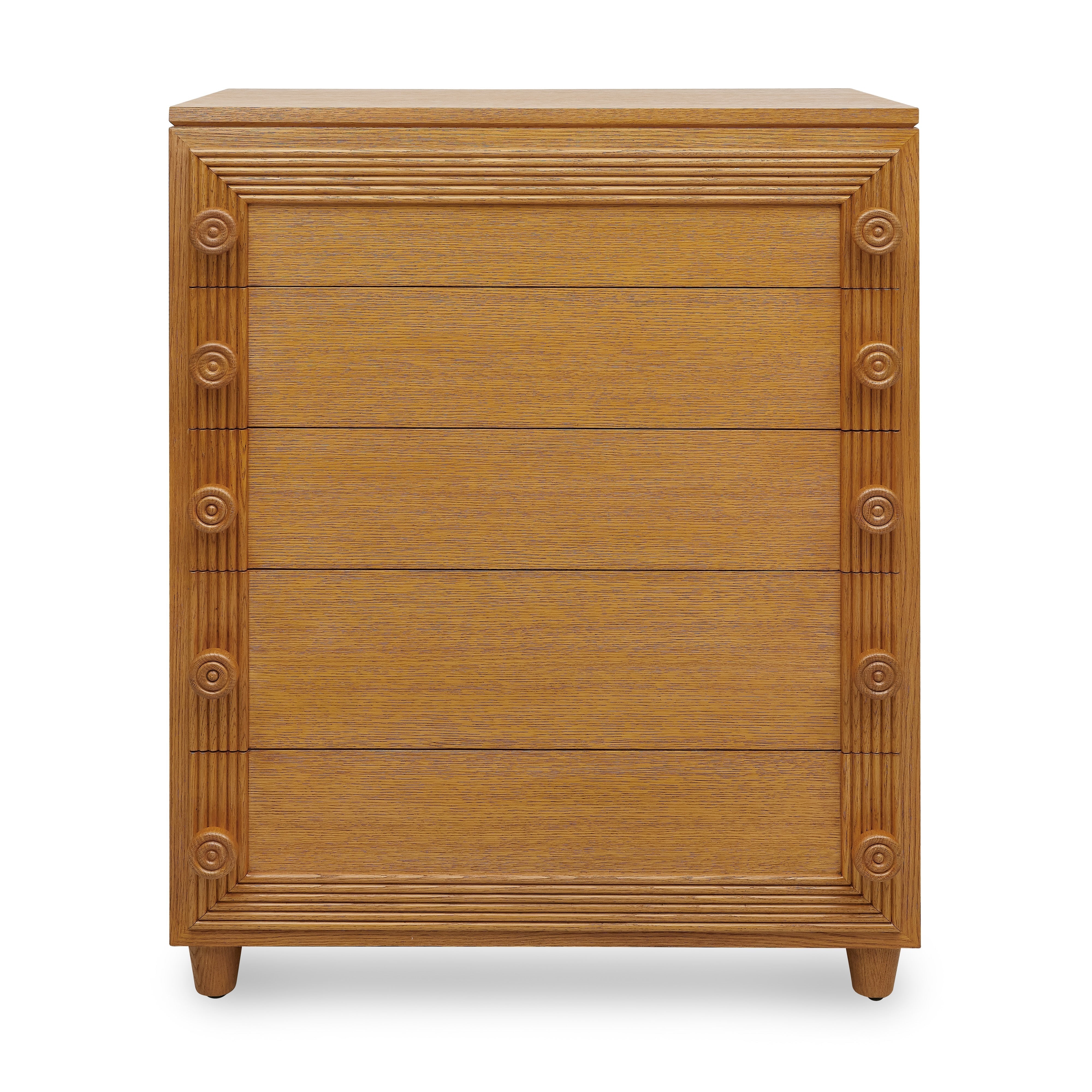 Wooden dresser with decorative carvings on a white background