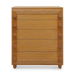 Wooden dresser with decorative carvings on a white background