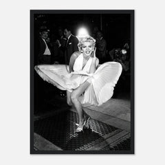 Marilyn Monroe in iconic white dress over subway grate, capturing timeless Hollywood elegance in framed print.