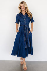 Front view of denim midi dress with collared neckline, short sleeves, removable belt and side pockets.