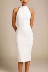 Woman wearing a figure flattering Lea Bandage Midi Dress - Pearl White Bodycon Collection