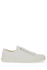 Moschino men’s sneaker edge white low-top canvas sneaker with silver eyelets and white rubber sole
