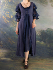 Navy Blue Kirtle Dress with empire waist and sheer puff sleeves inspired by Medieval Renaissance fashion.