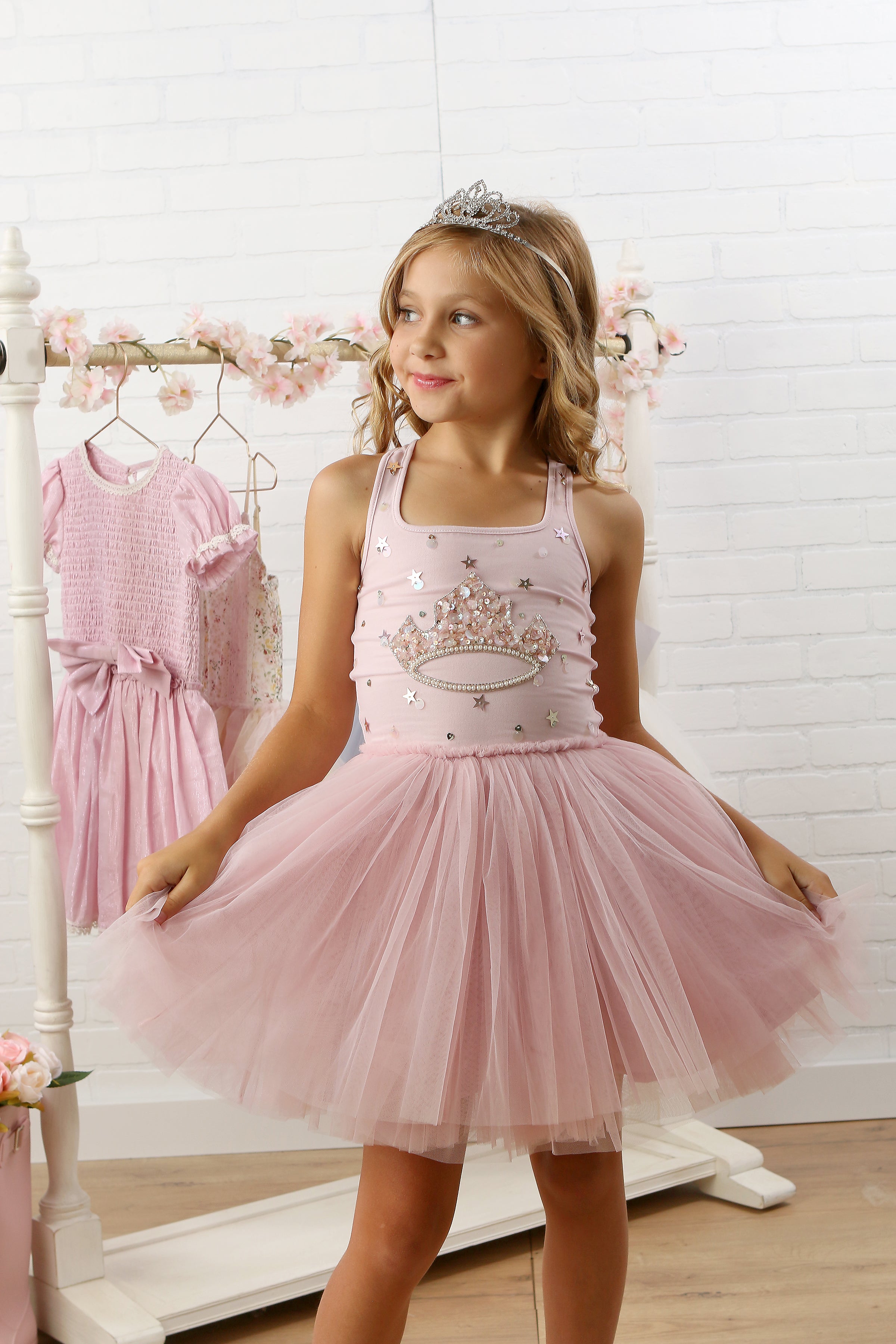 girls pink princess dress with crown at the chest
