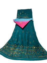 Teal embroidered fabric with gold patterns