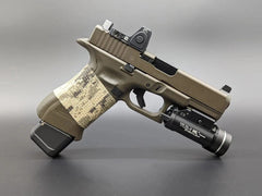 side view of Glock with mag extension