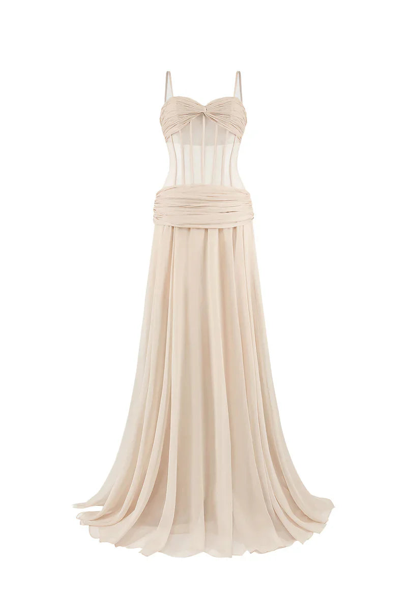 CEM nude chiffon maxi gown with an extra-long silhouette, featuring a fitted corset bodice and flowing skirt.