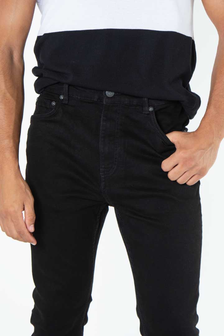 alt="Francisco Tolli black carrot denim jeans front close view"