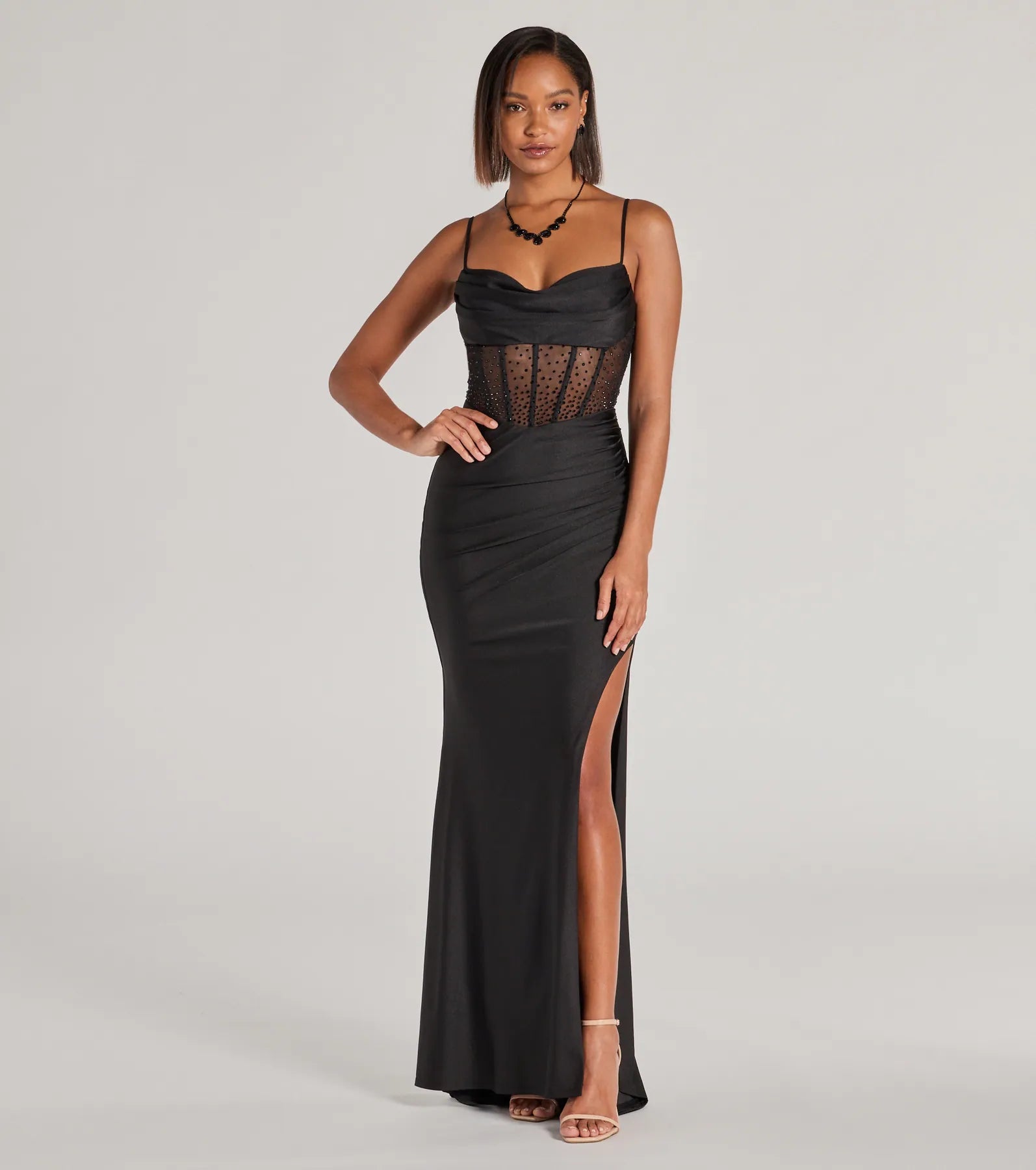 Feel polished and confident in the Sadie Rhinestone Corset Open Back Mermaid Formal Dress, a black prom dress designed with luxe fabric and modern detail that shows off your vibe.