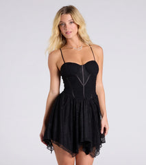 The Turn On The Charm Corset Lace Skater Mini Dress is a stylish black lace dress, designed with intricate lace and an alluring silhouette, making it an elegant choice for Valentine's Day, weddings, or effortless summer looks.
