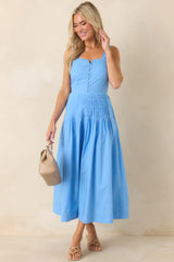 Lightweight 100% cotton dress featuring a button-front design, pleated waistline, and a flattering, easy-to-wear silhouette.