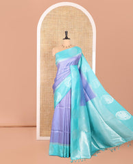 Grey Elite Soft Silk Saree Ornamented with Vaira Oosi and Zari Buttas All Over Its Body, Complemented by a Contrast Border Featuring Chakram Motifs, Subtly Sparkled Pallu, and Paired with a Contrast Blouse