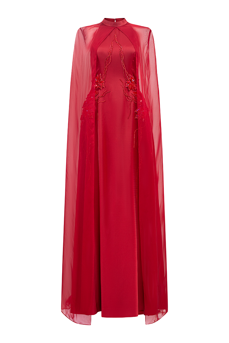 Long see-through cape flared gown by Tracy Studio, featuring sheer fabric and elegant flowing design.