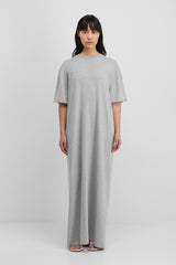 woman wearing a grey floor-length  cotton cashmere t-shirt dress.