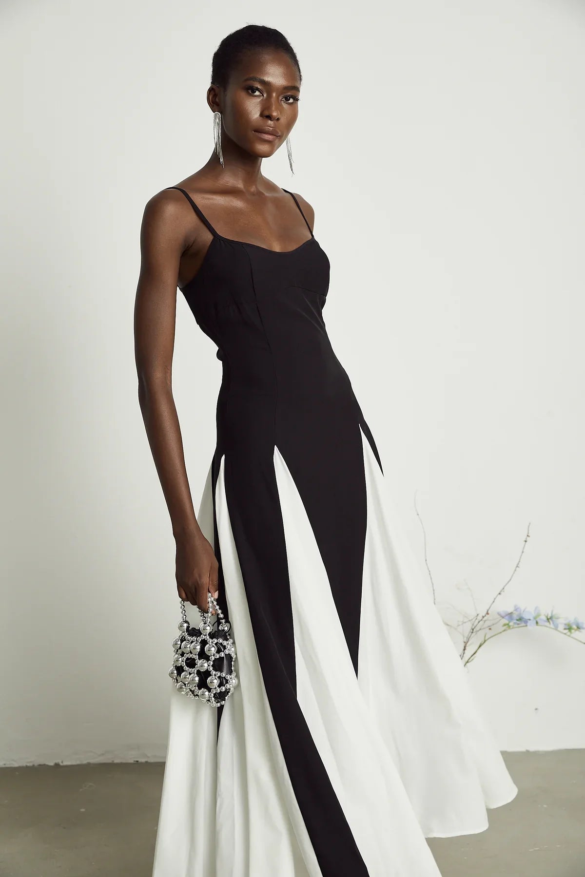 Yvette black and white pleated maxi dress with adjustable straps and scoop back. Vienna Brand Shopping Fashion
