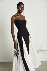 Yvette black and white pleated maxi dress with adjustable straps and scoop back. Vienna Brand Shopping Fashion