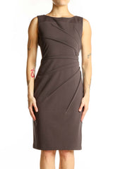 Front view of Calvin Klein brown sleeveless sheath dress with asymmetrical pleating