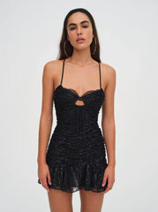 Woman in the For Love and Lemons Bette Mini Lace Dress