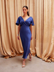 Shailene Flutter Sleeve Dress in recycled satin with deep V-neckline, flutter sleeves, ruching detail, and midi length
