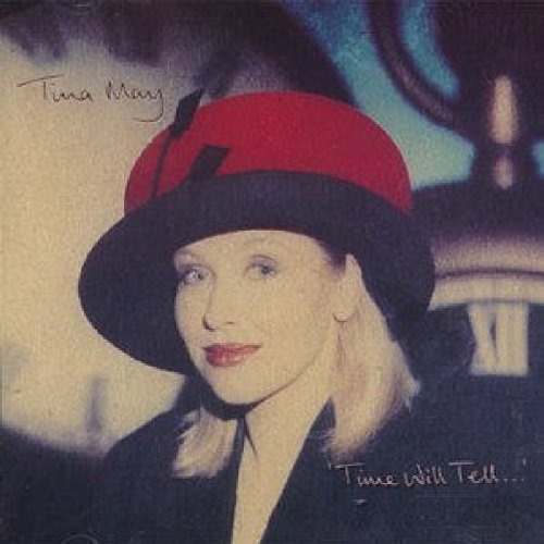 "Album cover featuring a blonde woman wearing a red and black hat."