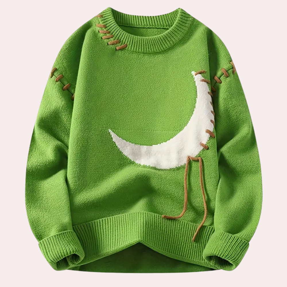 Grønn genser med hvit måne-design og brune snøredetaljer. Perfekt for høst- og vintermote. Komfortabel og stilfull strikkegenser.